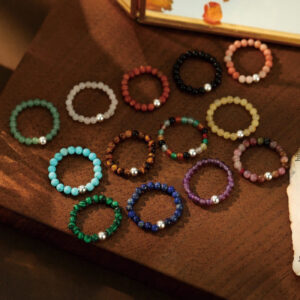 Multi-stone healing crystal elastic beads bracelets assorted colors overhead view