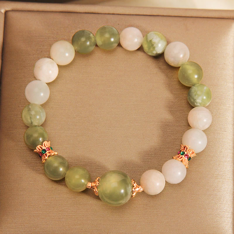 Green jade grape abundance bracelet close-up detail showing natural stone texture