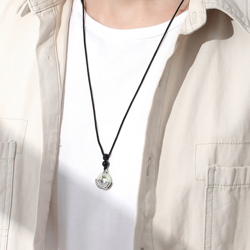 Man wearing Hetian jade peace buckle necklace at collarbone with casual white and beige outfit, everyday styling
