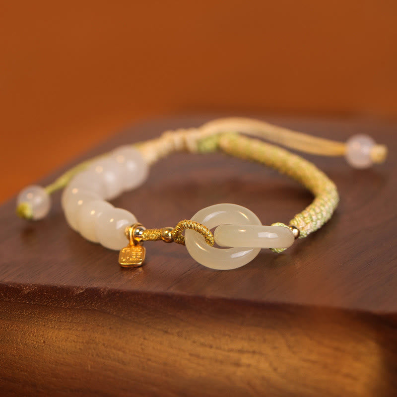 Hetian jade braided bracelet handmade craftsmanship detail showing woven cord work