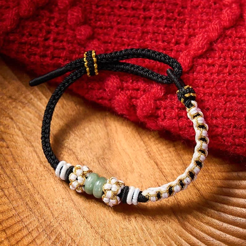 Adjustable jade bracelet red cord woven peach blossom luck symbol