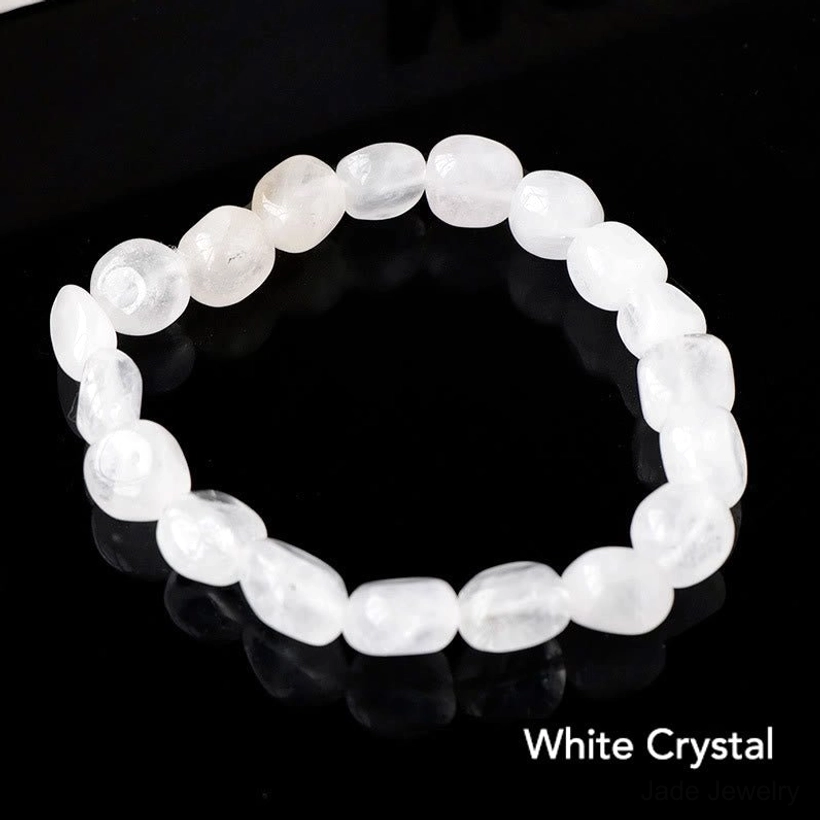Multi-stone crystal bracelet with amethyst, aventurine, and quartz stones overhead perspective