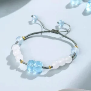 Natural aquamarine Pixiu bracelet with gold metal spacers loose beads and gray braided rope detail