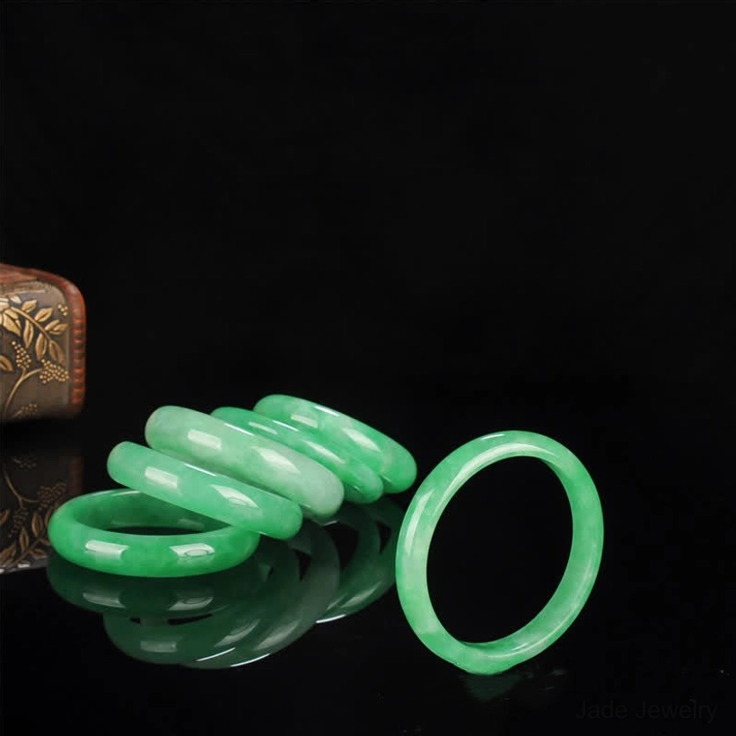 Authentic green jade bangle bracelet showcasing natural stone beauty, perfect for business success and financial abundance