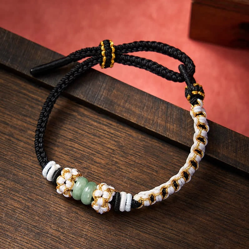 Black braided jade luck bracelet with gold thread peach blossom design
