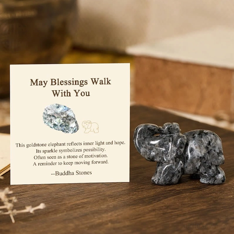 Black stone elephant figurine protective guardian carved from natural crystal