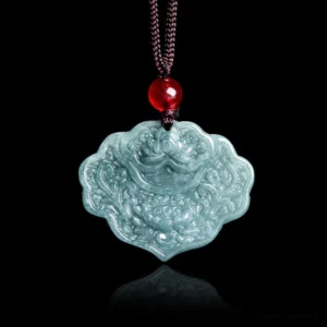 Hand-carved celadon jade lotus pendant with intricate floral engravings and brown cord, front view