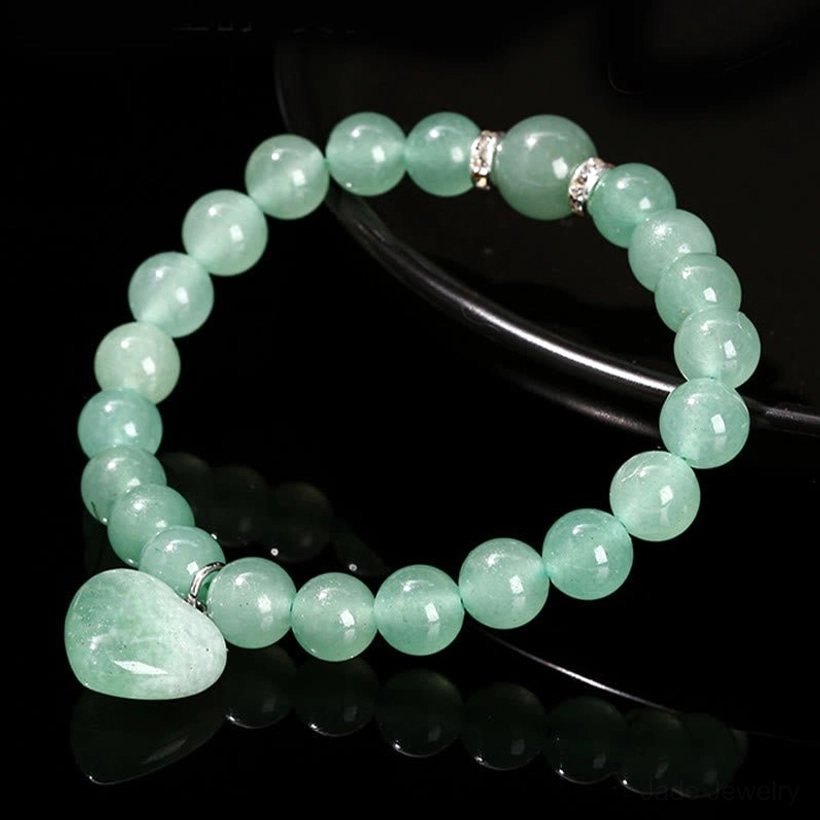 Clear Quartz crystal heart charm bracelet for meditation and clarity