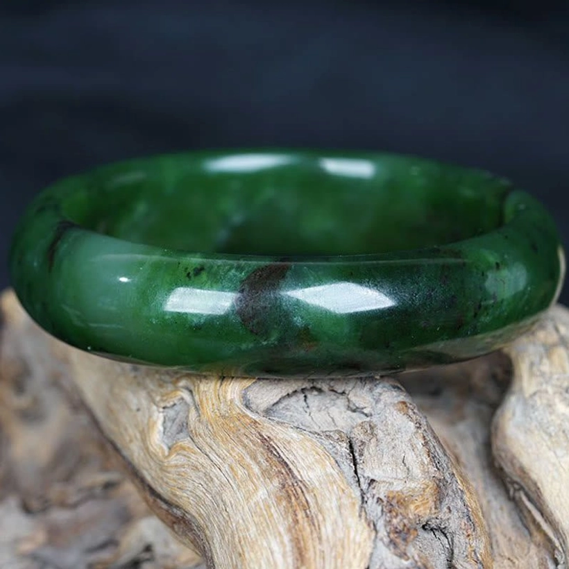 Cyan jade bangle top-down view showing smooth polished rim and inner diameter