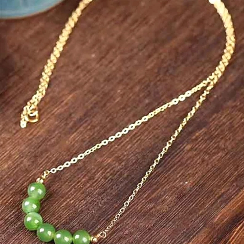 Extended flat lay overhead view of cyan jade beaded pendant necklace displaying full 45cm length with arc-shaped bead arrangement on delicate gold cable chain - complete jade prosperity necklace