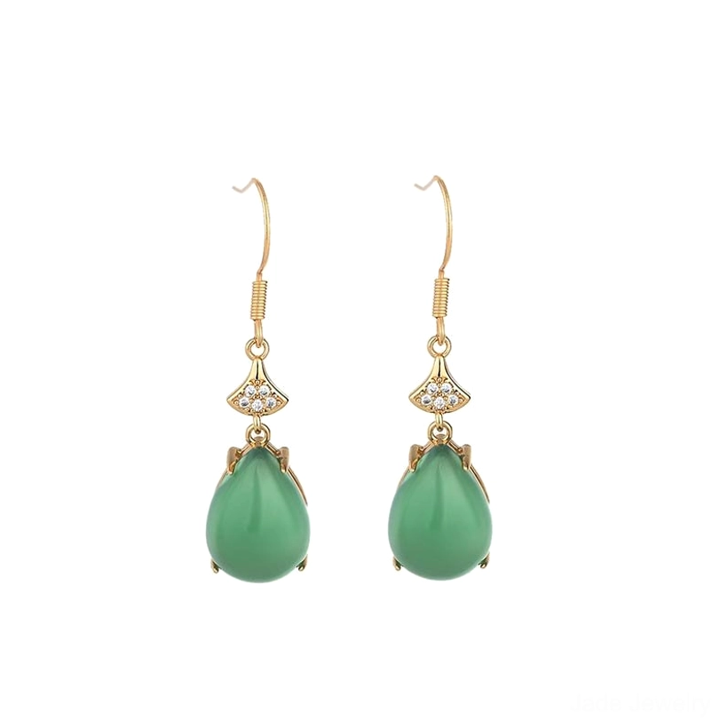Minimalist product photography of cyan jade drop earrings on dark seamless background, frontal flat lay view showcasing the matching fan-shaped zircon accents and polished jade finish