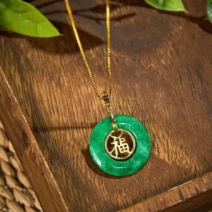 Cyan jade fu character peace buckle necklace flat lay on wooden surface with natural lighting