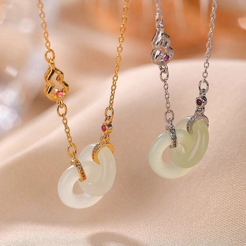 Gold and silver chain variants of double jade hoop pendant necklace side by side comparison