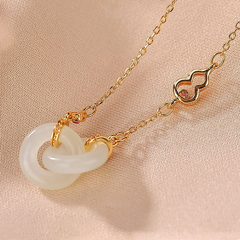Double jade hoop necklace side view showing polished gold chain and hollow gourd charm link