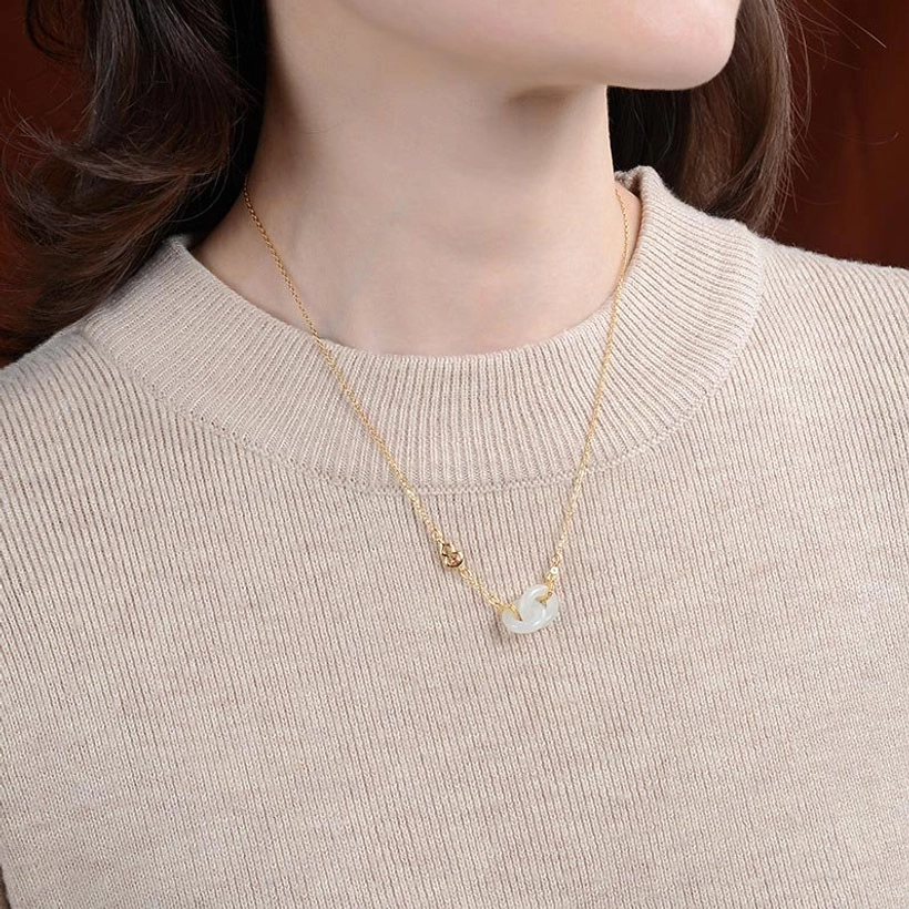 Worn double jade hoop prosperity necklace on neck, thin gold chain casual daily wear