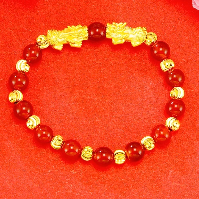 Gold-plated double Pixiu red agate fortune bracelet top view, bright red natural agate beads with golden Pixiu charms
