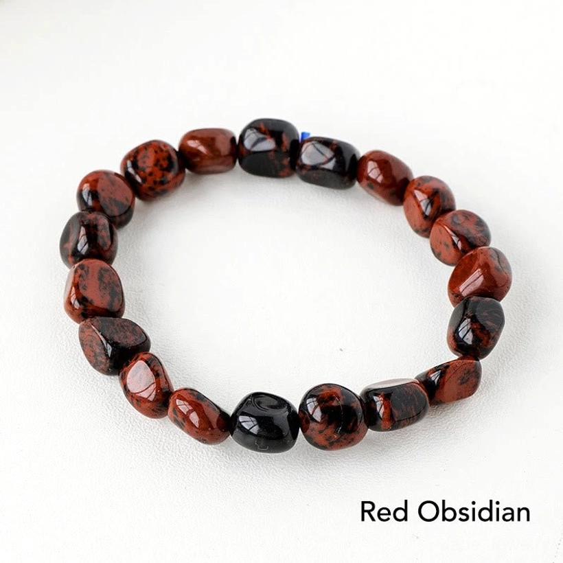 Dragon blood stone and rhodochrosite crystal healing bracelet for courage and compassion
