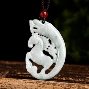 Dragon horse jade pendant necklace carved with intricate hollow design, displayed on wooden stand with brown rope cord and red bead