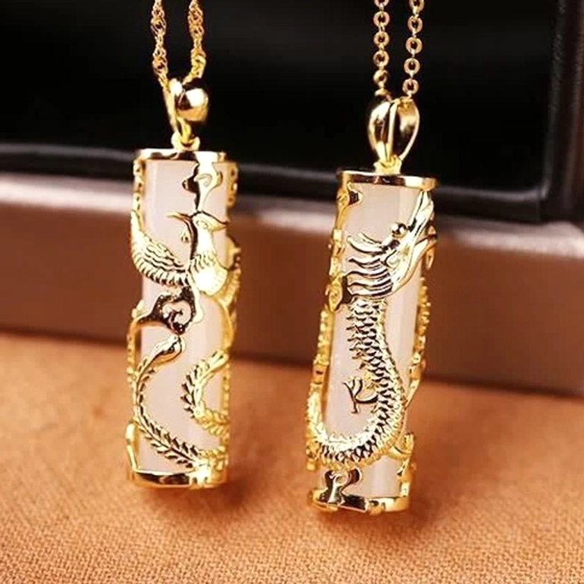 Dragon and phoenix jade pendant pair set showing complementary celestial symbols representing yin-yang harmony and balance