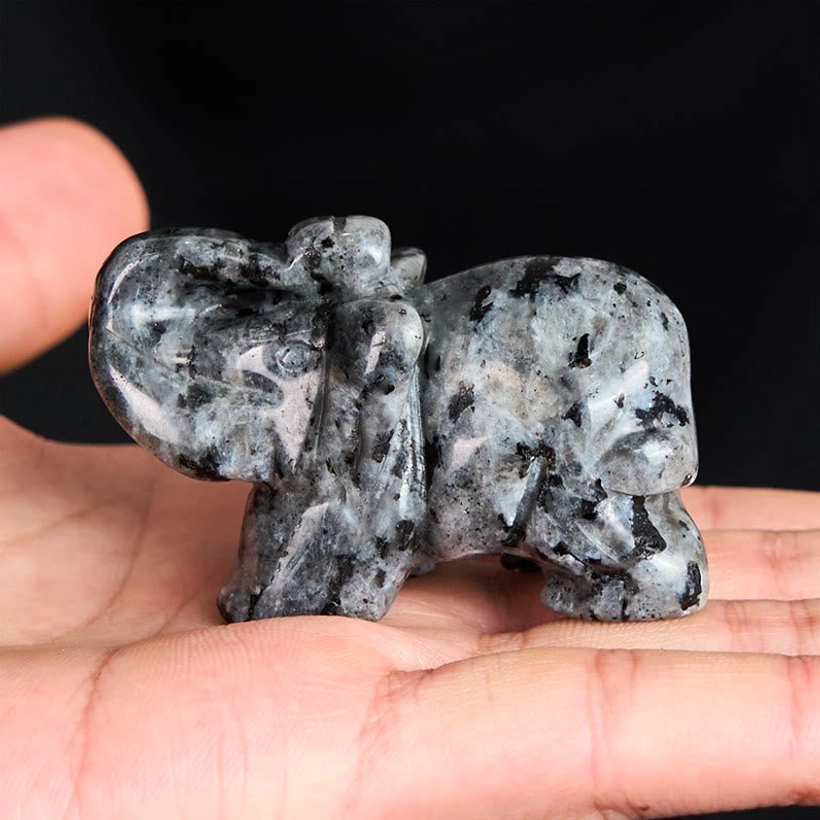 Elephant figurine healing stone promoting calm communication and peace