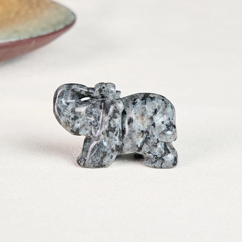 Elephant healing stone figurine inspiring confidence and positive transformation