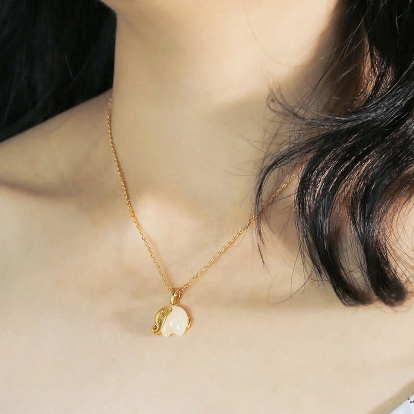 Elephant jade necklace worn on neck, delicate 925 silver chain daily wear style