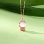 Rose gold plated formless Buddha chalcedony pendant necklace with micro-pave sterling silver detail on spiritual Buddha hood
