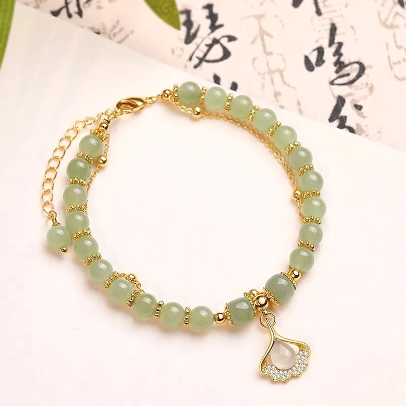 Ginkgo leaf jade beads bracelet with 24K gold-plated copper charm prosperity design