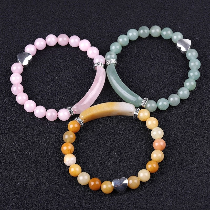 Golden silk jade heart bracelet featuring traditional Chinese jade with warm golden tones