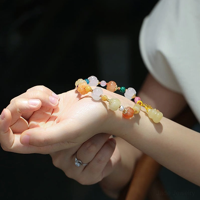 Golden silk jade pixiu wealth bracelet natural gemstone collection luxury gift presentation