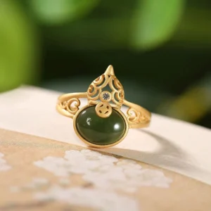 Gourd cyan jade copper coin adjustable ring flat lay vintage desktop display