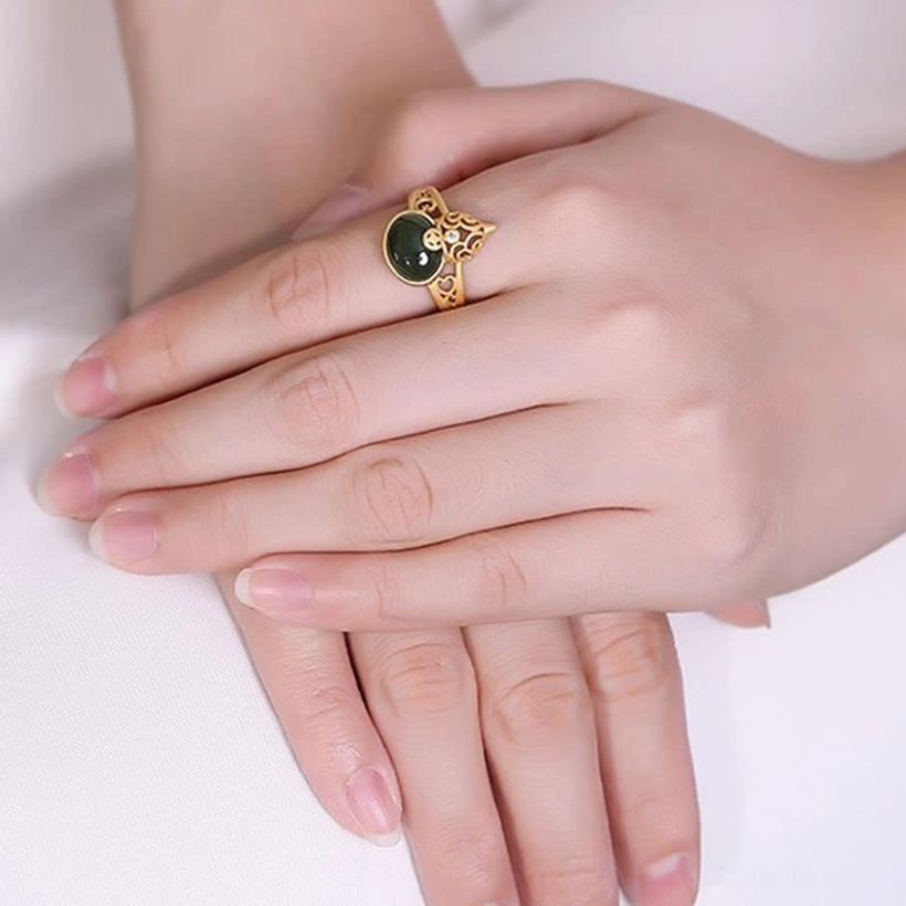 Gourd jade copper coin ring front view worn on middle finger natural manicure