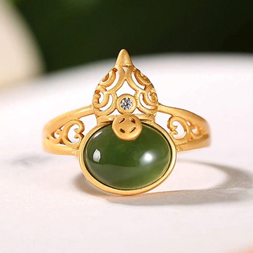 Close up detail gourd cyan jade ring hollow carving stone display