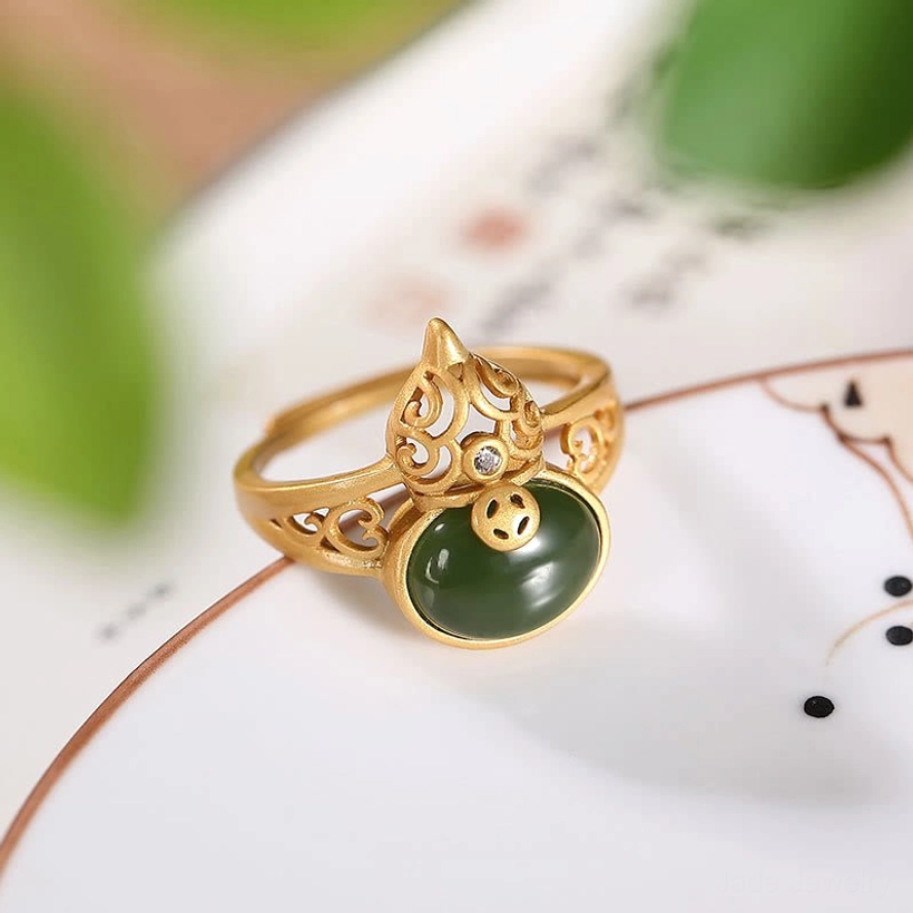 Adjustable gourd jade ring side view hollow gold carving detail