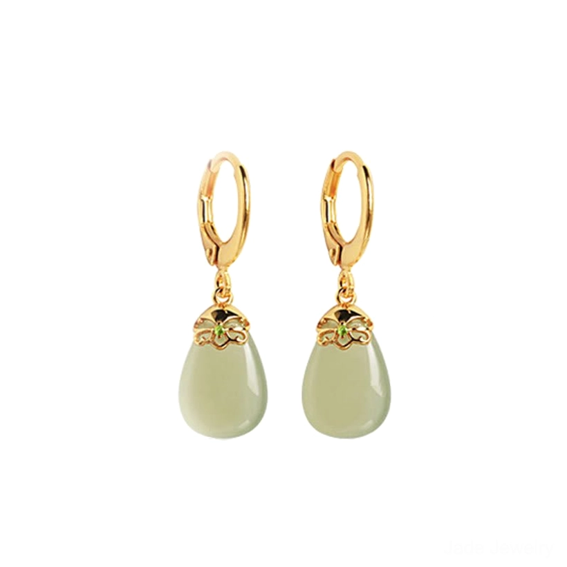 Green chalcedony water drop earrings front facing showing gold metal work pale green jade stones metaphysical beauty