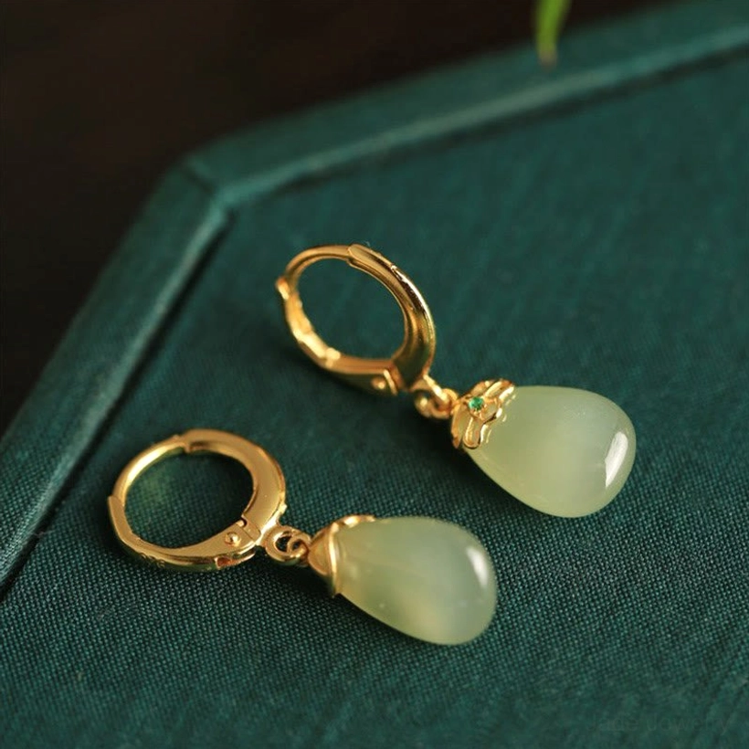 Green chalcedony water drop earrings showing natural stone characteristics color variation authentic gemstone beauty