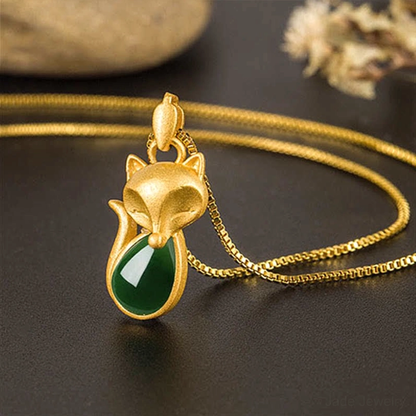 Green chalcedony fox gold necklace pendant - front close-up showing teardrop jade inlay detail