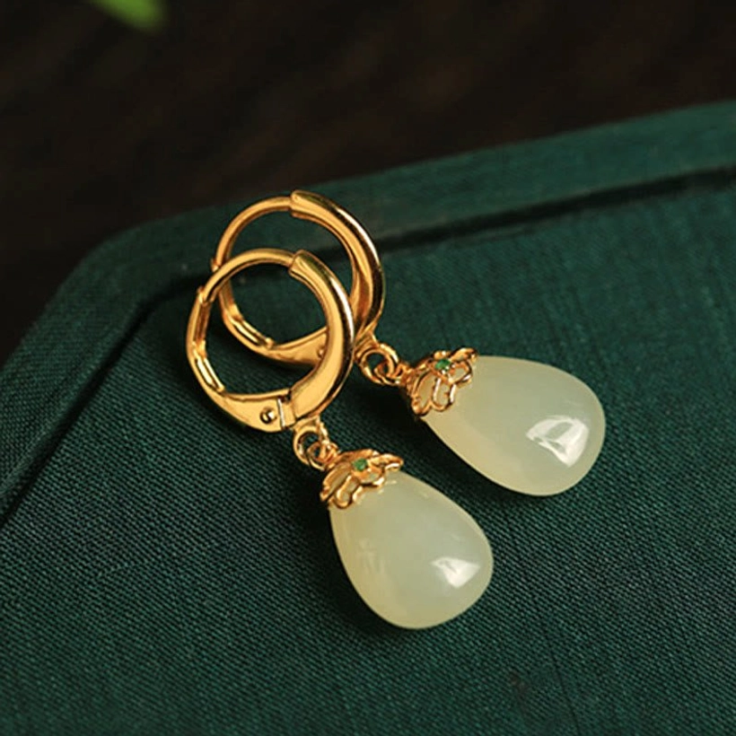 Green chalcedony earrings with white chalcedony accents decorative metal cap floral design pale green jade pendant drops