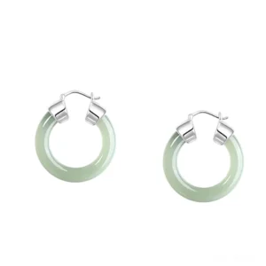 Green jade hoop earrings front view on white background, polished natural jade with silver metal closures