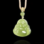 Natural green jade Laughing Buddha pendant necklace with braided rope, front flat view on studio background