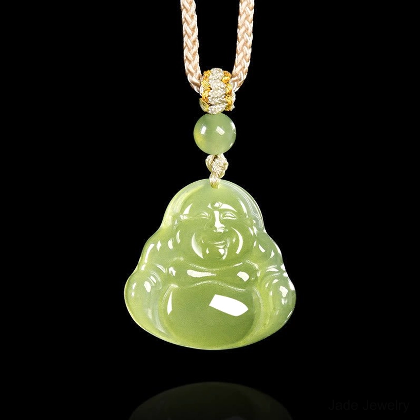 Natural green jade Laughing Buddha pendant necklace with braided rope, front flat view on studio background