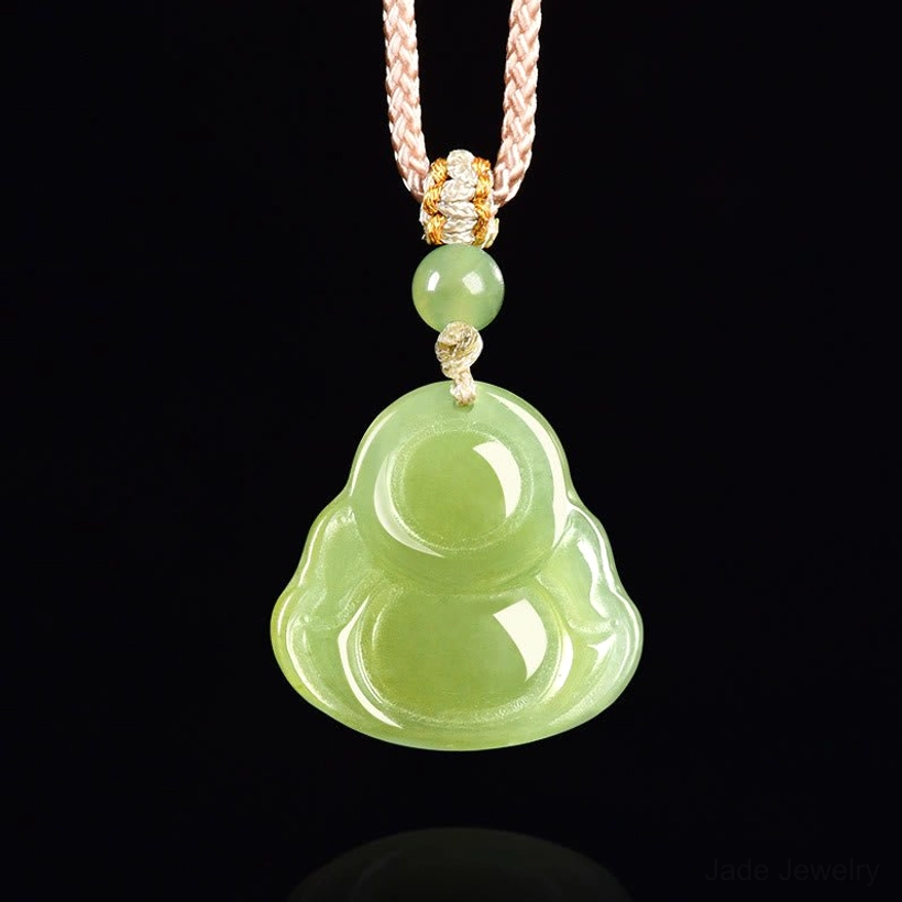 Natural green jade Laughing Buddha pendant necklace studio photography with professional lighting