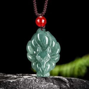 Natural green jade nine-tailed fox pendant necklace with brown braided cord and red bead, front flat view