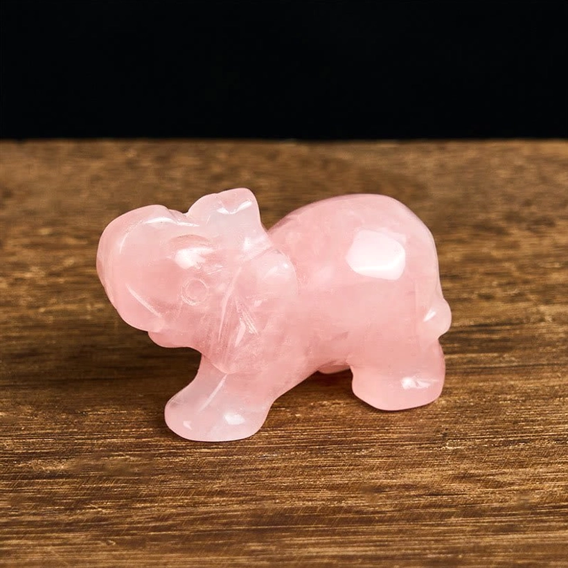 Hand-polished stone elephant showing natural mineral beauty and smooth carving
