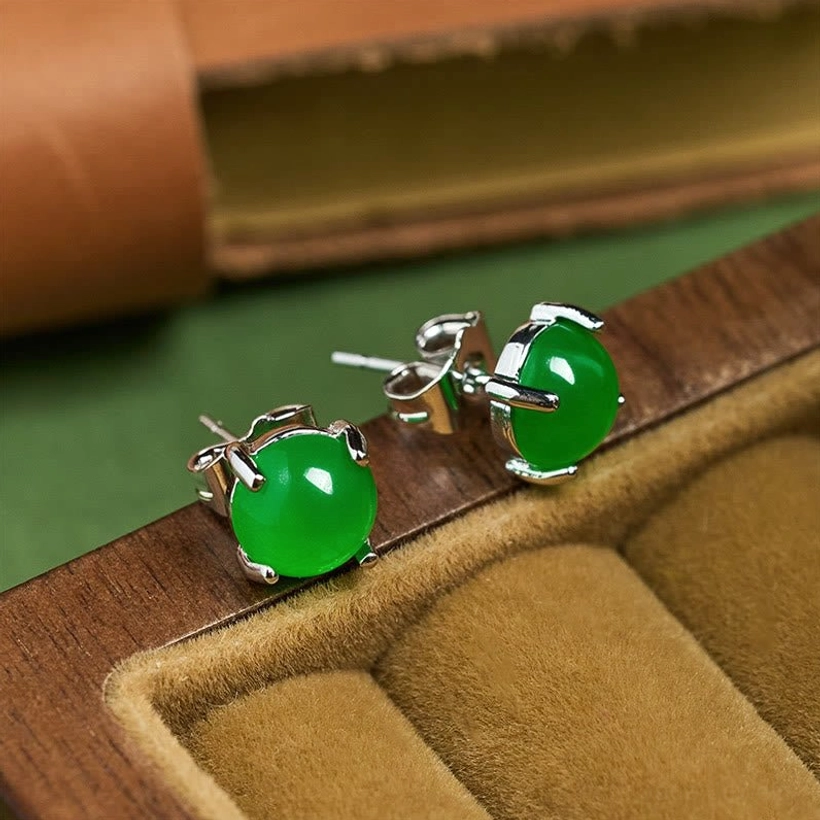 Natural jade stud earring featuring authentic stone variations and handcrafted 925 sterling silver design