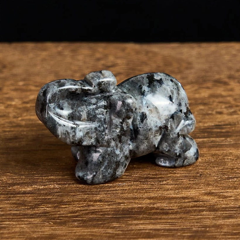 Handmade elephant stone figurine with unique natural crystal characteristics