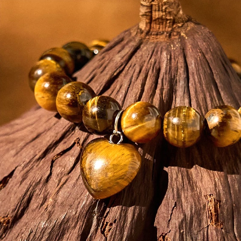 Handmade natural stone heart bracelet showing artisan craftsmanship and detail