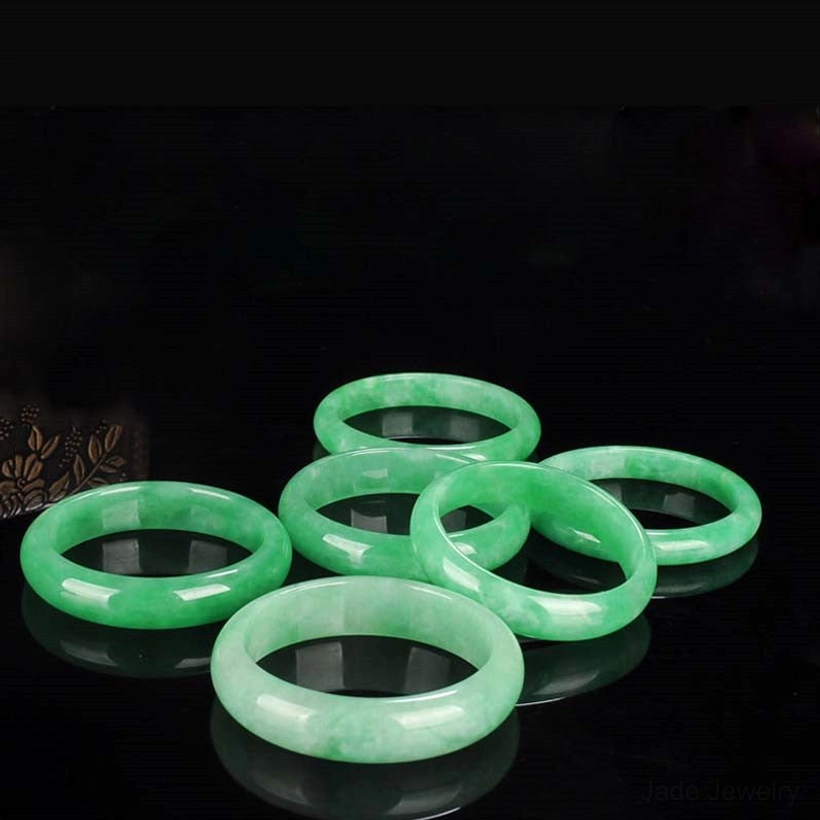 Premium handmade jade bangle bracelet featuring natural green jade with smooth polished surface and traditional Asian craftsmanship
