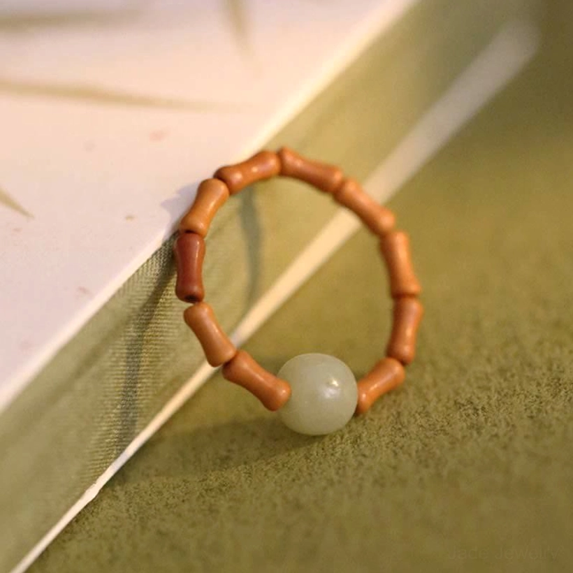 Hetian jade bamboo prosperity ring lifestyle shot demonstrating daily wearability and spiritual intention