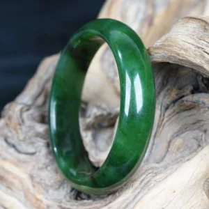 Natural cyan jade bangle with deep green mineral veins authentic texture